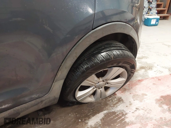 2013 Kia Sportage LX with VIN KNDPB3A2XD7446504, listed as a IAAI auction lot 41271313 with 94,646 mi miles and . Bid and sale history available at DreamBid. Image 6.