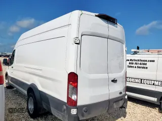 2023 Ford Transit Cargo with VIN 1FTRU8XGXPKC05787, listed as a Copart auction lot 59768665 with 24,845 mi miles and Salvage title. Bid and sale history available at DreamBid. Image 2.