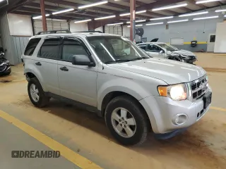 2010 Ford Escape XLT с VIN 1FMCU9D76AKB94757, выставлен на аукционе Copart как лот 55735585 с пробегом 175 030 миль миль и Списание • Salvage title. История ставок и продаж доступна на DreamBid. Изображение 4.