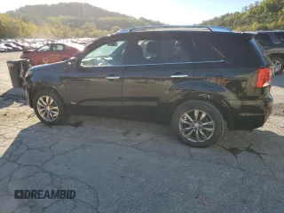 2013 Kia Sorento SX z VIN 5XYKWDA24DG385142, wystawiony jako Copart lot #75187514 z przebiegiem 119 027 mil mil oraz Szkoda całkowita • Salvage title. Historia ofert i sprzedaży dostępna na DreamBid. Obrazek 2.
