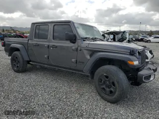 2023 Jeep Gladiator Freedom with VIN 1C6JJTAG9PL557861, listed as a Copart auction lot 50452955 with 44,716 mi miles and Salvage Title. Bid and sale history available at carsss.com. Image 4.