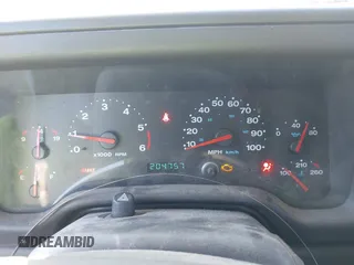 2002 Jeep Wrangler Sport with VIN 1J4FA49SX2P732367, listed as a IAAI auction lot 41805923 with 204,757 mi miles. Bid and sale history available at carsss.com. Image 7.