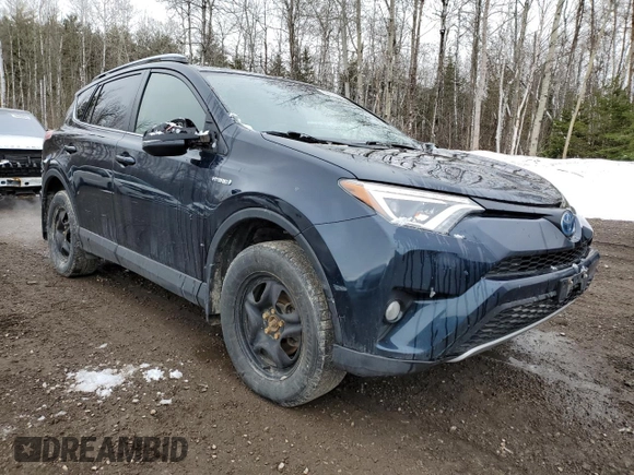 2018 Toyota RAV4 Hybrid SE with VIN JTMJJREV6JD225530, listed as a Copart auction lot 52000985 with 150,642 mi miles and Salvage title. Bid and sale history available at DreamBid. Image 4.