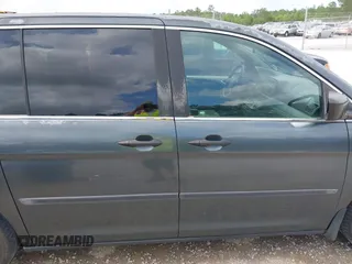 2006 Honda Odyssey LX z VIN 5FNRL38296B099742, wystawiony jako IAAI lot #42112509 z przebiegiem 328 220 mil mil oraz . Historia ofert i sprzedaży dostępna na DreamBid. Obrazek 13.