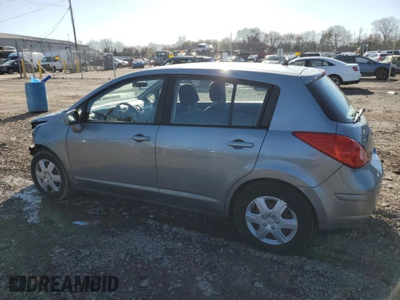 2010 Nissan Versa 1.8 S with VIN 3N1BC1CP9AL468234, listed as a Copart auction lot 52142665 with 127,396 mi miles and Salvage Title. Bid and sale history available at carsss.com. Image 2.