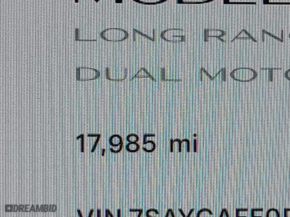 2023 Tesla Model Y Long Range with VIN 7SAYGAEE0PF787216, listed as a IAAI auction lot 41589954 with 17,985 mi miles. Bid and sale history available at carsss.com. Image 16.