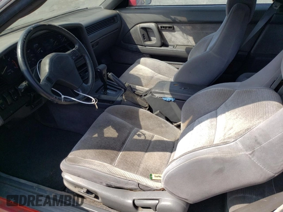 1989 Toyota Supra z VIN JT2MA70J3K0114537, wystawiony jako Copart lot #72587854 z przebiegiem 189 813 mil mil oraz Czysty tytuł • Clean title. Historia ofert i sprzedaży dostępna na DreamBid. Obrazek 7.