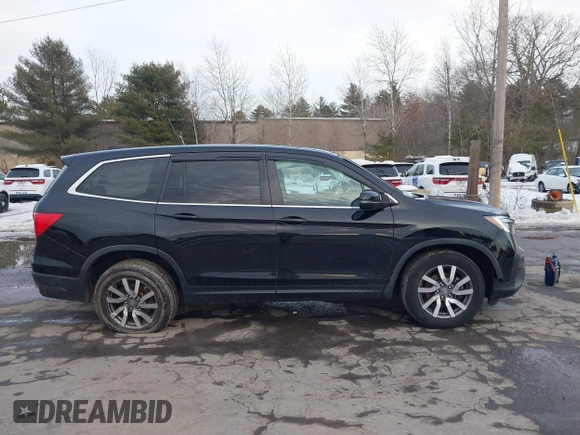 2020 Honda Pilot EX-L z VIN 5FNYF6H50LB022798, wystawiony jako IAAI lot #41592012 z przebiegiem 67 045 mil mil oraz . Historia ofert i sprzedaży dostępna na DreamBid. Obrazek 13.
