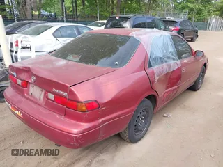 1997 Toyota Camry LE z VIN 4T1BG22K3VU090917, wystawiony jako IAAI lot #42174600 z przebiegiem 213 850 mil mil oraz . Historia ofert i sprzedaży dostępna na DreamBid. Obrazek 4.