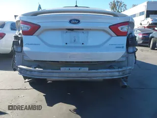 2016 Ford Fusion Titanium Hybrid with VIN 3FA6P0RU1GR259947, listed as a IAAI auction lot 41695377 with 97,605 mi miles. Bid and sale history available at carsss.com. Image 6.
