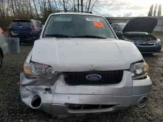 2005 Ford Escape Hybrid with VIN 1FMCU95H95KC74177, listed as a Copart auction lot 77361724 with 195,199 mi miles and Salvage title. Bid and sale history available at DreamBid. Image 5.