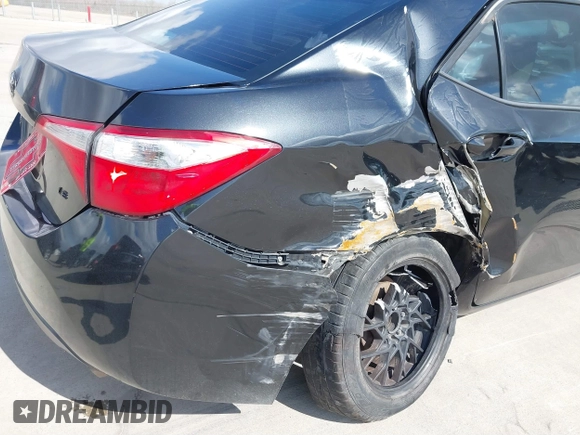 2015 Toyota Corolla L with VIN 5YFBURHE3FP307047, listed as a IAAI auction lot 41525250 with 181,605 mi miles and . Bid and sale history available at DreamBid. Image 6.