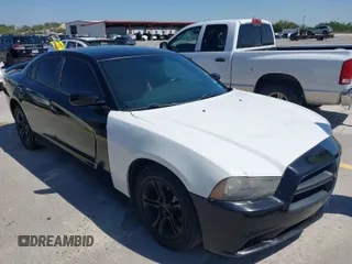 2014 Dodge Charger SXT with VIN 2C3CDXHG0EH207166, listed as a IAAI auction lot 41929294 with 182,392 mi miles. Bid and sale history available at carsss.com. Image 1.