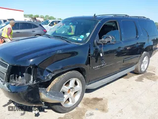 2013 Chevrolet Suburban LT with VIN 1GNSCJE0XDR255326, listed as a IAAI auction lot 41969643 with 176,494 mi miles. Bid and sale history available at carsss.com. Image 2.