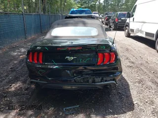 2018 Ford Mustang EcoBoost Premium z VIN 1FATP8UH4J5117856, wystawiony jako IAAI lot #42675106 z przebiegiem 110 587 mil mil oraz . Historia ofert i sprzedaży dostępna na DreamBid. Obrazek 16.
