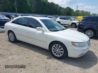 2007 Hyundai Azera SE z VIN KMHFC46F07A176082, wystawiony jako IAAI lot #42163164 z przebiegiem 146 021 mil mil oraz . Historia ofert i sprzedaży dostępna na DreamBid. Obrazek 1.