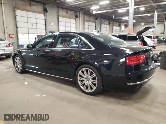 2014 Audi A8 3.0T z VIN WAURGAFD1EN009932, wystawiony jako Copart lot #84607914 z przebiegiem 87 981 mil mil oraz Szkoda całkowita • Salvage title. Historia ofert i sprzedaży dostępna na DreamBid. Obrazek 2.