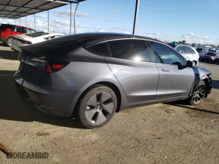2023 Tesla Model 3 with VIN 5YJ3E1EA2PF438259, listed as a Copart auction lot 44572595 with 28,194 mi miles and Salvage Title. Bid and sale history available at carsss.com. Image 3.