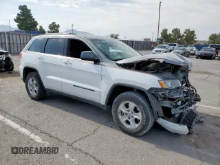 2017 Jeep Grand Cherokee Laredo with VIN 1C4RJEAG6HC614543, listed as a Copart auction lot 55804605 with 89,730 mi miles and Salvage title. Bid and sale history available at DreamBid. Image 4.