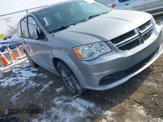 2015 Dodge Grand Caravan SE with VIN 2C4RDGBG3FR653239, listed as a IAAI auction lot 41607222 with 124,732 mi miles and . Bid and sale history available at DreamBid. Image 1.