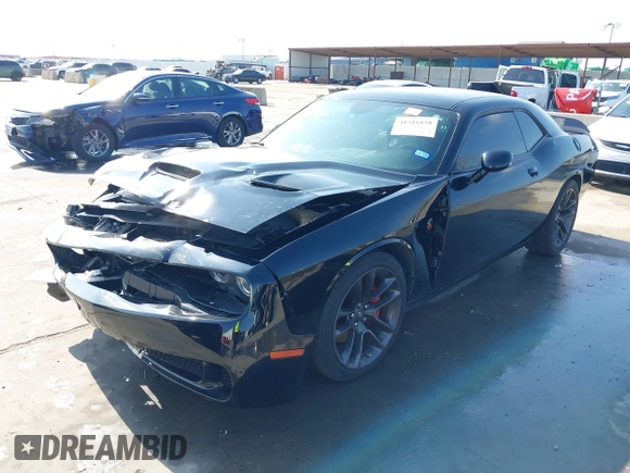 2021 Dodge Challenger R/T Scat Pack z VIN 2C3CDZFJXMH509833, wystawiony jako IAAI lot #41516858 z przebiegiem 66 880 mil mil oraz . Historia ofert i sprzedaży dostępna na DreamBid. Obrazek 18.
