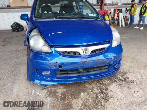 2007 Honda Fit Sport z VIN JHMGD38667S014334, wystawiony jako IAAI lot #42349784 z przebiegiem 176 274 mil mil oraz . Historia ofert i sprzedaży dostępna na DreamBid. Obrazek 6.