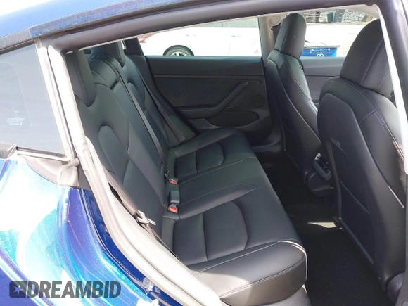 2021 Tesla Model 3 Performance with VIN 5YJ3E1EC1MF000961, listed as a IAAI auction lot 42110524 with 31,890 mi miles and . Bid and sale history available at carsss.com. Image 8.