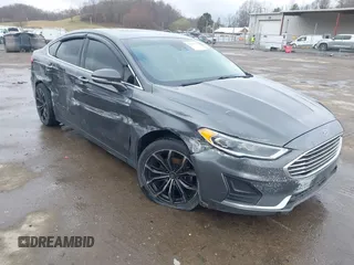 2019 Ford Fusion SEL with VIN 3FA6P0CD6KR141832, listed as a IAAI auction lot 41800102 with 142,282 mi miles and . Bid and sale history available at carsss.com. Image 1.