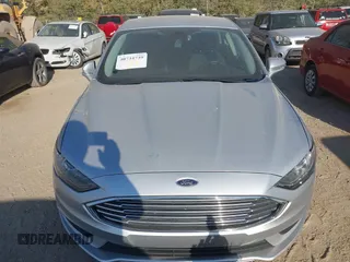 2017 Ford Fusion SE z VIN 3FA6P0H73HR236618, wystawiony jako IAAI lot #40734739 z przebiegiem 189 000 mil mil oraz . Historia ofert i sprzedaży dostępna na DreamBid. Obrazek 12.