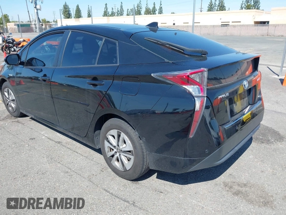 2018 Toyota Prius Two with VIN JTDKBRFU9J3061915, listed as a IAAI auction lot 41840107 with 62,782 mi miles and . Bid and sale history available at carsss.com. Image 3.