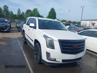 2020 Cadillac Escalade Luxury z VIN 1GYS3BKJ3LR144735, wystawiony jako IAAI lot #42161511 z przebiegiem 77 990 mil mil oraz . Historia ofert i sprzedaży dostępna na DreamBid. Obrazek 1.