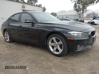2012 BMW 3 Series 328i with VIN WBA3A5C58CF345936, listed as a IAAI auction lot 42097965 with 159,150 mi miles. Bid and sale history available at carsss.com. Image 1.