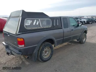 1999 Ford Ranger XLT with VIN 1FTZR15X2XTA82007, listed as a IAAI auction lot 41746346 with 229,182 mi miles. Bid and sale history available at carsss.com. Image 4.