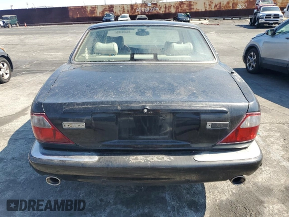 2003 Jaguar XJ with VIN SAJDA15B63MF52618, listed as a Copart auction lot 64336415 with Not provided miles and Clean title. Bid and sale history available at DreamBid. Image 6.