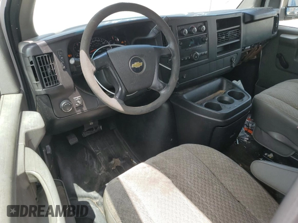 2013 Chevrolet Express Cargo with VIN 1GCWGFBA4D1105381, listed as a Copart auction lot 60138065 with 209,922 mi miles and Salvage title. Bid and sale history available at DreamBid. Image 8.