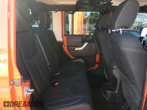 2015 Jeep Wrangler Unlimited Rubicon with VIN 1C4BJWFG7FL719038, listed as a Copart auction lot 51507205 with 62,664 mi miles and Salvage Title. Bid and sale history available at carsss.com. Image 10.