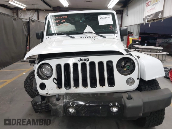 2017 Jeep Wrangler Unlimited Sahara with VIN 1C4BJWEG2HL700840, listed as a IAAI auction lot 42631036 with 60,610 mi miles and . Bid and sale history available at DreamBid. Image 12.