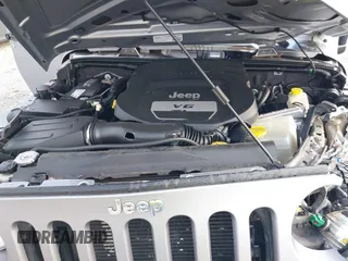2014 Jeep Wrangler Unlimited Sport with VIN 1C4BJWDG8EL314792, listed as a IAAI auction lot 41489203 with 94,382 mi miles. Bid and sale history available at carsss.com. Image 10.