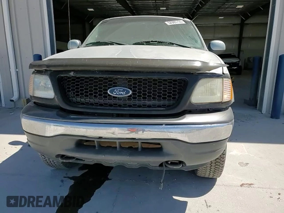 2002 Ford F-150 XL с VIN 1FTRX18L02NA22576, выставлен на аукционе Copart как лот 52985795 с пробегом Не указан миль и Списание • Salvage title. История ставок и продаж доступна на DreamBid. Изображение 11.