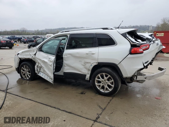 2015 Jeep Cherokee Latitude with VIN 1C4PJLCB9FW532301, listed as a Copart auction lot 52379335 with 153,845 mi miles and Salvage Title. Bid and sale history available at DreamBid. Image 2.
