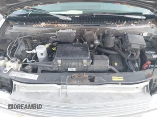 2003 Chevrolet Astro z VIN 1GNEL19X63B115821, wystawiony jako IAAI lot #41923632 z przebiegiem 107 341 mil mil oraz . Historia ofert i sprzedaży dostępna na DreamBid. Obrazek 10.
