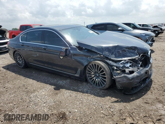 2016 BMW 7 Series 740i z VIN WBA7E2C57GG714564, wystawiony jako Copart lot #56186285 z przebiegiem 111 598 mil mil oraz Szkoda całkowita • Salvage title. Historia ofert i sprzedaży dostępna na DreamBid. Obrazek 4.