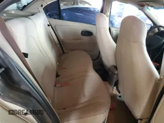 2002 Saturn SL z VIN 1G8ZH52842Z165459, wystawiony jako Copart lot #57273035 z przebiegiem 84 482 mil mil oraz Szkoda całkowita • Salvage title. Historia ofert i sprzedaży dostępna na DreamBid. Obrazek 10.
