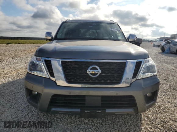 2019 Nissan Armada Platinum with VIN JN8AY2NE1K9759322, listed as a Copart auction lot 71734094 with 59,315 mi miles and Salvage Title. Bid and sale history available at carsss.com. Image 5.