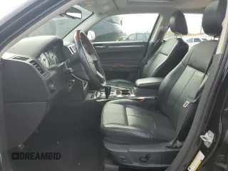 2009 Chrysler 300 with VIN 2C3LK33V19H614083, listed as a Copart auction lot 77529014 with 188,125 mi miles and Salvage title. Bid and sale history available at DreamBid. Image 7.