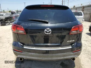2015 Mazda CX-9 Sport z VIN JM3TB2BAXF0447315, wystawiony jako Copart lot #60842505 z przebiegiem 122 281 mil mil oraz Szkoda całkowita • Salvage title. Historia ofert i sprzedaży dostępna na DreamBid. Obrazek 6.