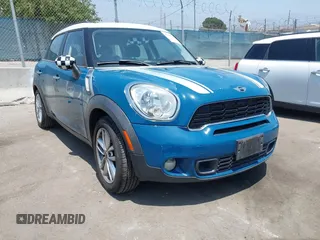 2011 MINI Countryman S z VIN WMWZC3C54BWL80271, wystawiony jako IAAI lot #42382785 z przebiegiem 121 939 mil mil oraz . Historia ofert i sprzedaży dostępna na DreamBid. Obrazek 1.
