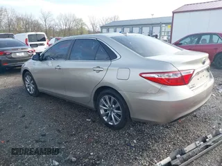 2017 Toyota Camry Hybrid LE with VIN 4T1BD1FK9HU214495, listed as a IAAI auction lot 41953655 with 106,409 mi miles. Bid and sale history available at carsss.com. Image 3.
