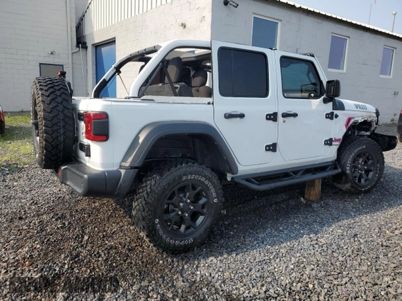 2021 Jeep Wrangler Unlimited 80th Anniversary z VIN 1C4HJXDG4MW794519, wystawiony jako Copart lot #60116105 z przebiegiem 25 708 mil mil oraz Szkoda całkowita • Salvage title. Historia ofert i sprzedaży dostępna na DreamBid. Obrazek 3.