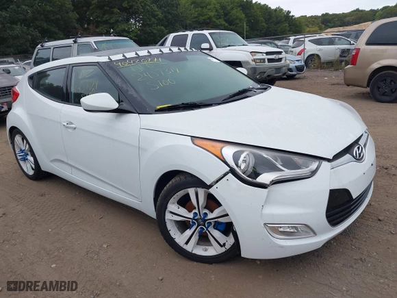2016 Hyundai Veloster with VIN KMHTC6ADXGU273034, listed as a IAAI auction lot 40420771 with 206,694 mi miles. Bid and sale history available at carsss.com. Image 1.